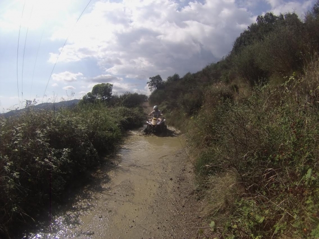  Going through the mud with the quad 